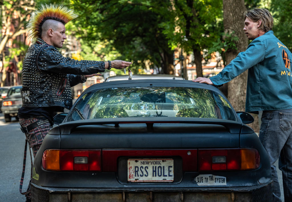 ‘Caught Stealing’: How Darren Aronofsky Pulled Off The Film’s Epic Car Chase Through Flushing Meadows