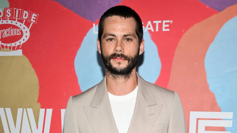 Dylan O’Brien On His ‘Twinless’ Mustache And Playing Drums For Taylor Swift’s ‘Snow On The Beach’: ‘It Was An All Time Bucket Lister For Me’