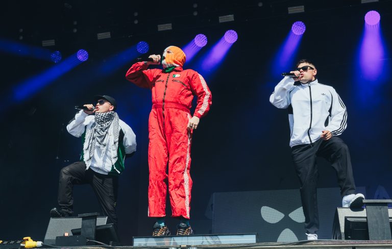 Watch “50,000 Fenians” Sing Back To Kneecap In Irish At Electric Picnic