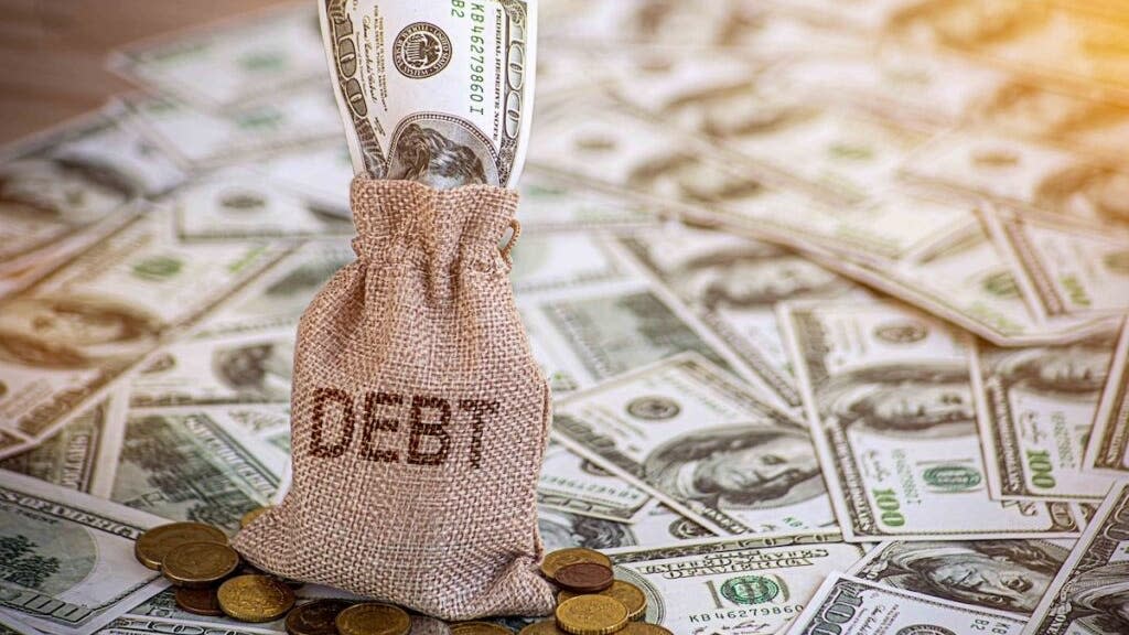 She Works Full Time And Supports Her Family, But She's Hiding $84,000 In Debt