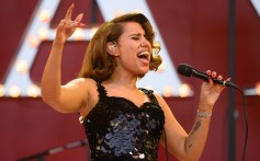 RAYE Plays Herself & Covers A Jazz Classic ‘Whilst Staring Into Jason Bateman’s Eyes’ In New Netflix ‘Black Rabbit’ Series: See Photos