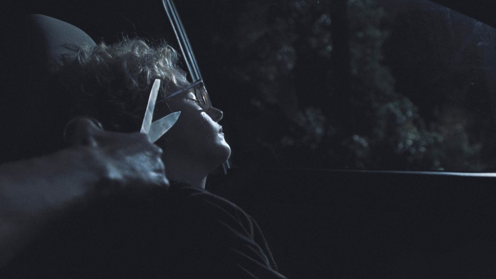 ‘Weapons’ Artisans Talk Happy Accidents, Director Zach Cregger’s “Very Practical Minded” Approach & The “Chokehold” Gladys Has On The Internet